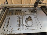 Water-jet-cut sheet-metal dehydrator panels with fan bores and slots on the machine bed